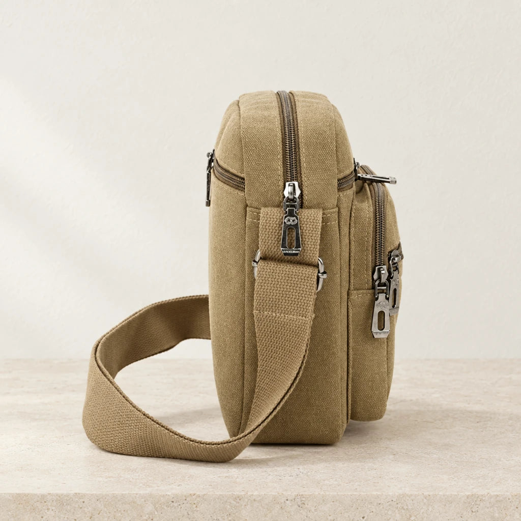 Profil de la sacoche en tissu beige avec sangle