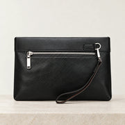 Dos de la pochette homme noire avec poche zippée