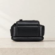 Dessous de la sacoche cuir noire